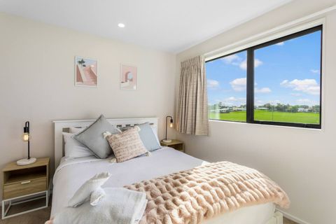 The main bedroom features a queen bed and ensuite bathroom.