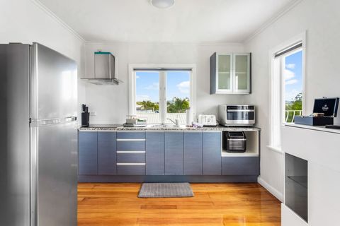 The large kitchen is well-equipped with all the necessary amenities to create a culinary masterpiece.