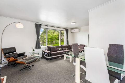 The modern glass dining table is perfect for a small space and can seat up to four guests.