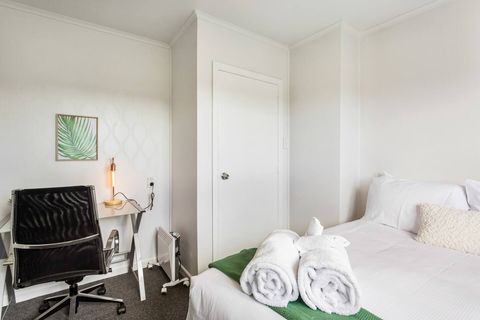 Matching artwork to the throw provides a cohesion of design in this bedroom.