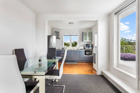 The dining space looks out onto the balcony, so you can eat and look at the incredible view.