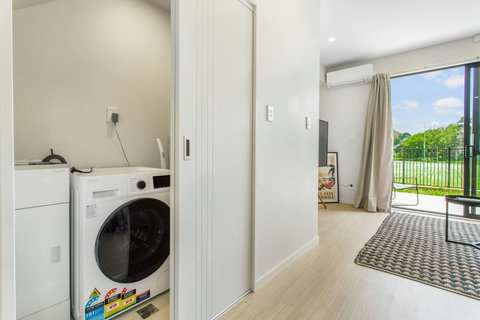 Hidden laundry with washer and dryer combo. Close the mess away at any time.