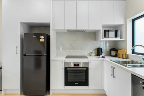 Modern kitchen with quality Bosch appliances.