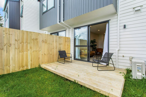 Sit chatting with your friends or family on this comfy deck area.