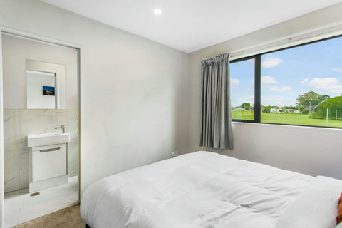 Second Queen bedroom overlooking the sports ground reserve.