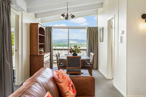 Open plan living from lounge, dining area and the outside deck.