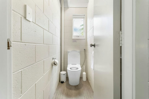 Separate toilet from main bathroom.