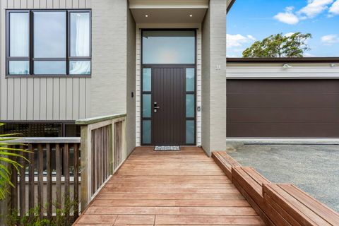 Welcoming wooden walkway leading up to the front door.