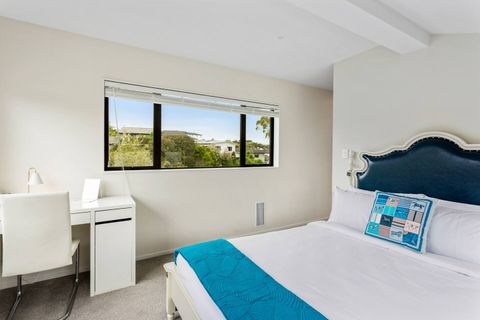 Queen bed in the navy blue with desk perfect for studying.