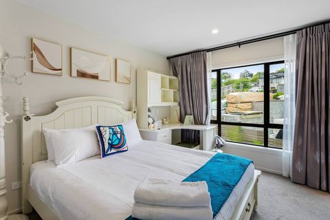 Lovely queen bedroom with drawers under the bed, and a small desk. This room does have an ensuite. 
There is construction going on the property next door.