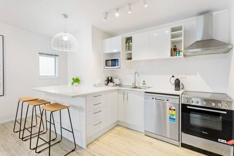 The kitchen is modern with all the appliances you need to create a culinary experience.