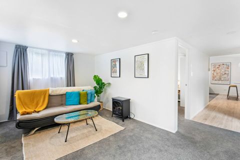 Front room with sofa that can be converted into a King Single sofa bed.