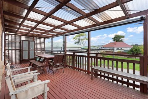 The back deck overlooks the lawn space, so you can watch the children playing while enjoying the fresh air.