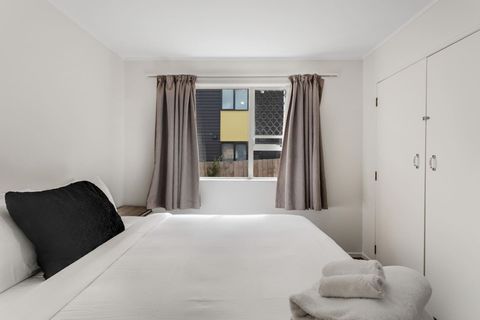 The bedroom has plenty of storage with a double wardrobe and two bedside cabinets.