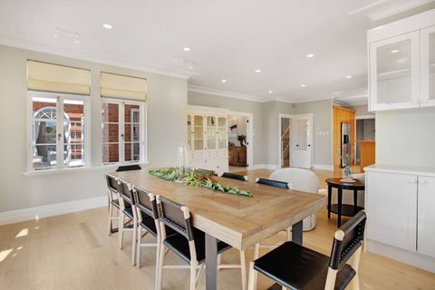 One of the dining areas that seats ten people at the long table.