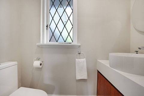 There is a separate toilet and vanity, which is great for family use.