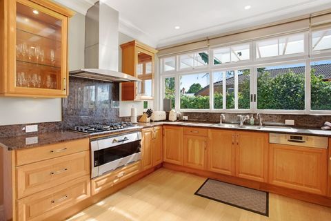 The kitchen has an oven, gas cooktop, dishwasher, microwave, fridge/freezer and plenty of storage space.