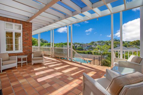 Enjoy the view from the verandah seating area, overlooking the pool.