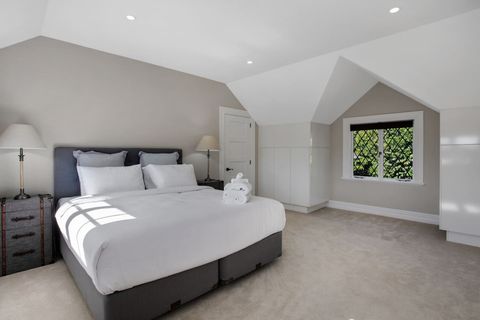 There are windows on both sides of the bedroom, which let in lots of light.