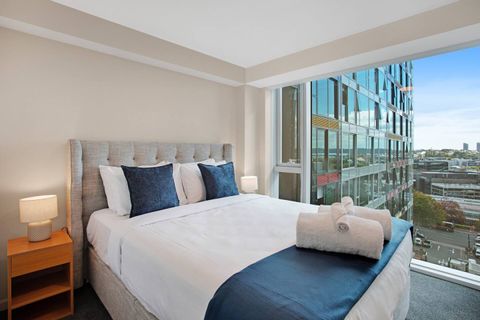 There are floor-to-ceiling windows in the Queen main bedroom.