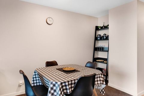 There is extra storage on the shelves in the corner.