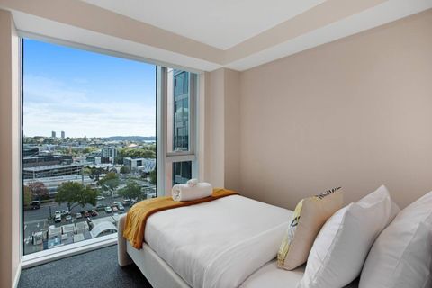 One of the King-single bedrooms has a great view over the city.