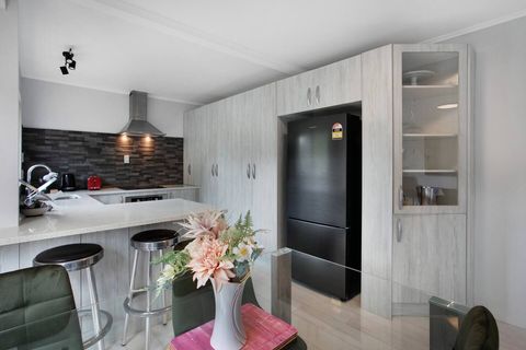 There is bar seating at the ktichen bench which is great for casual dining.