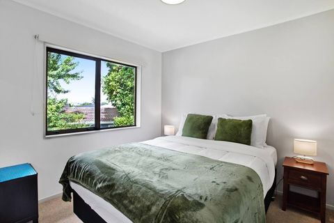 The second bedroom has lovely shades of green in the throw and cushions which brings the outside indoors.