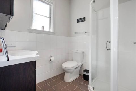 There is also an ensuite bathroom that has a vanity, shower and toilet.