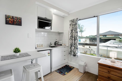 There is a dining area beside the kitchenette area, making good use of the space.