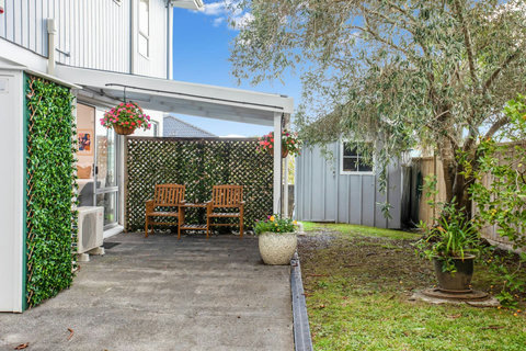 Enjoy the covered patio area as an extension of the unit.