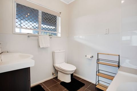 The ensuite bathroom is attached to the bedroom downstairs and has a spa bath.