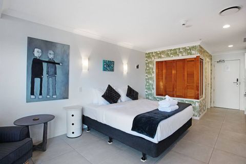 The bathroom has louvre shutters that can open or close depending on the level of privacy needed.