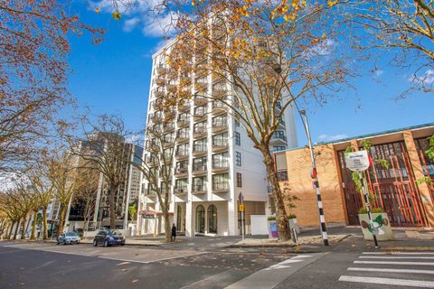 The view from the street towards the apartment building.