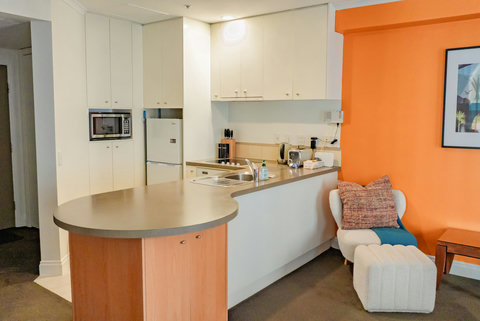 The kitchen has plenty of space if you wish to cook up a meal.