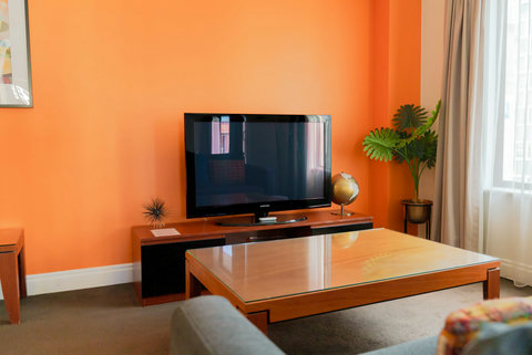 Relax on the couch and watch TV or read a book.