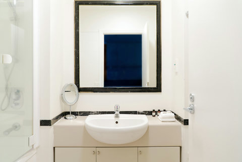 There is a handy vanity unit that has plenty of space for your belongings.