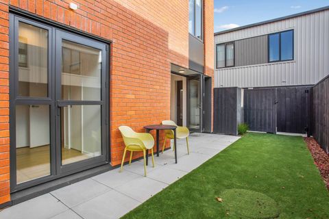 Enjoy the easy care back-yard with the comfy chairs and astro grass.