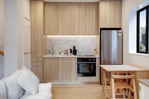 The dining table can be folded out to create extra table space.