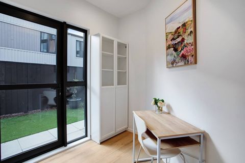 The office has plenty of natural light that streams in through the window.