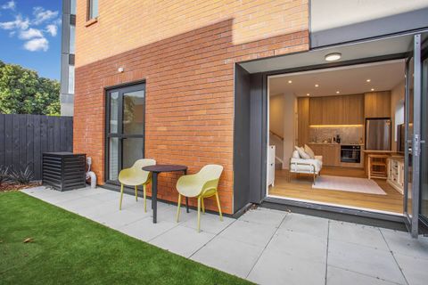 Open the bi-fold doors and enjoy the indoor/outdoor flow from the living room to the backyard.