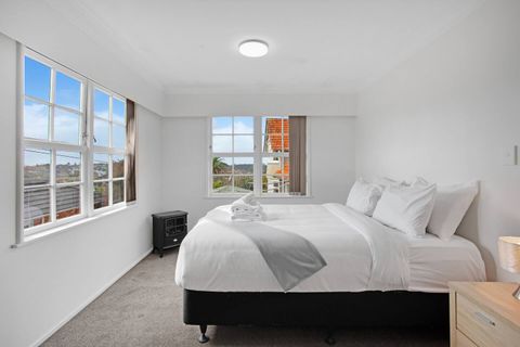 Enjoy the sunlight that streams into the bedroom through the double windows.
