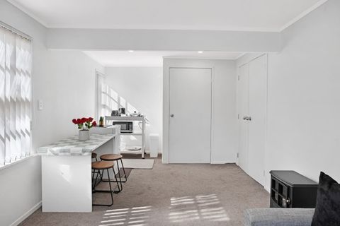 Great view of the open-plan living area with the lounge, dining area and kitchenette.