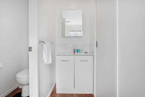 The vanity unit has storage for all your personal belongings.