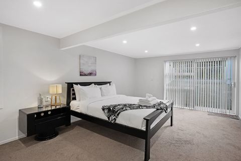 The bedroom has blinds that can be drawn to block out the light.