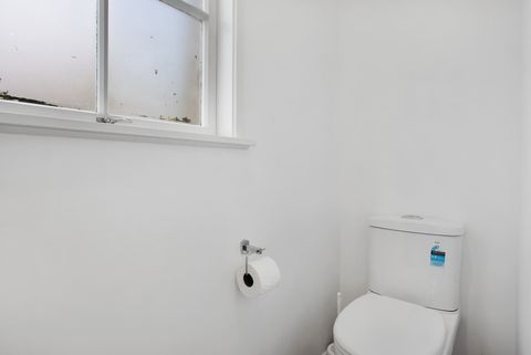 The toilet is in a separate room in the bathroom where you can shut the door.