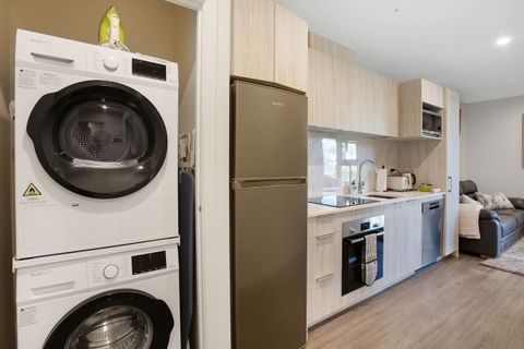 There is a washing machine and dryer in the kitchen area, which is great for longer stays.