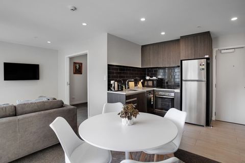 The kitchen, dining and lounge area are all part of the open-plan living space.