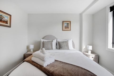 The headboard reminds me of a cloud on a summer's day.