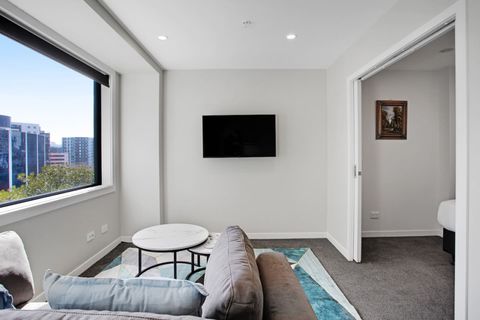 Relax on the couch and watch TV.